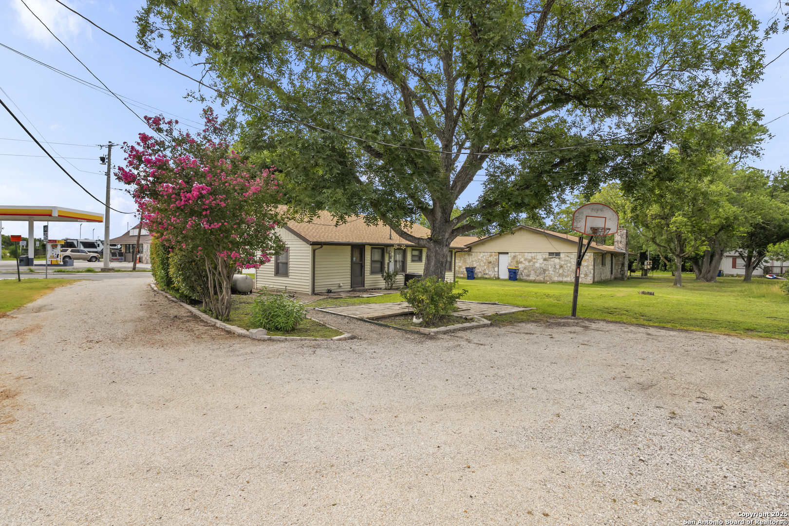 100 Haeckerville Road Cibolo, TX 78108 - Photo 14 of 31 a view of a house with outdoor space and tree s