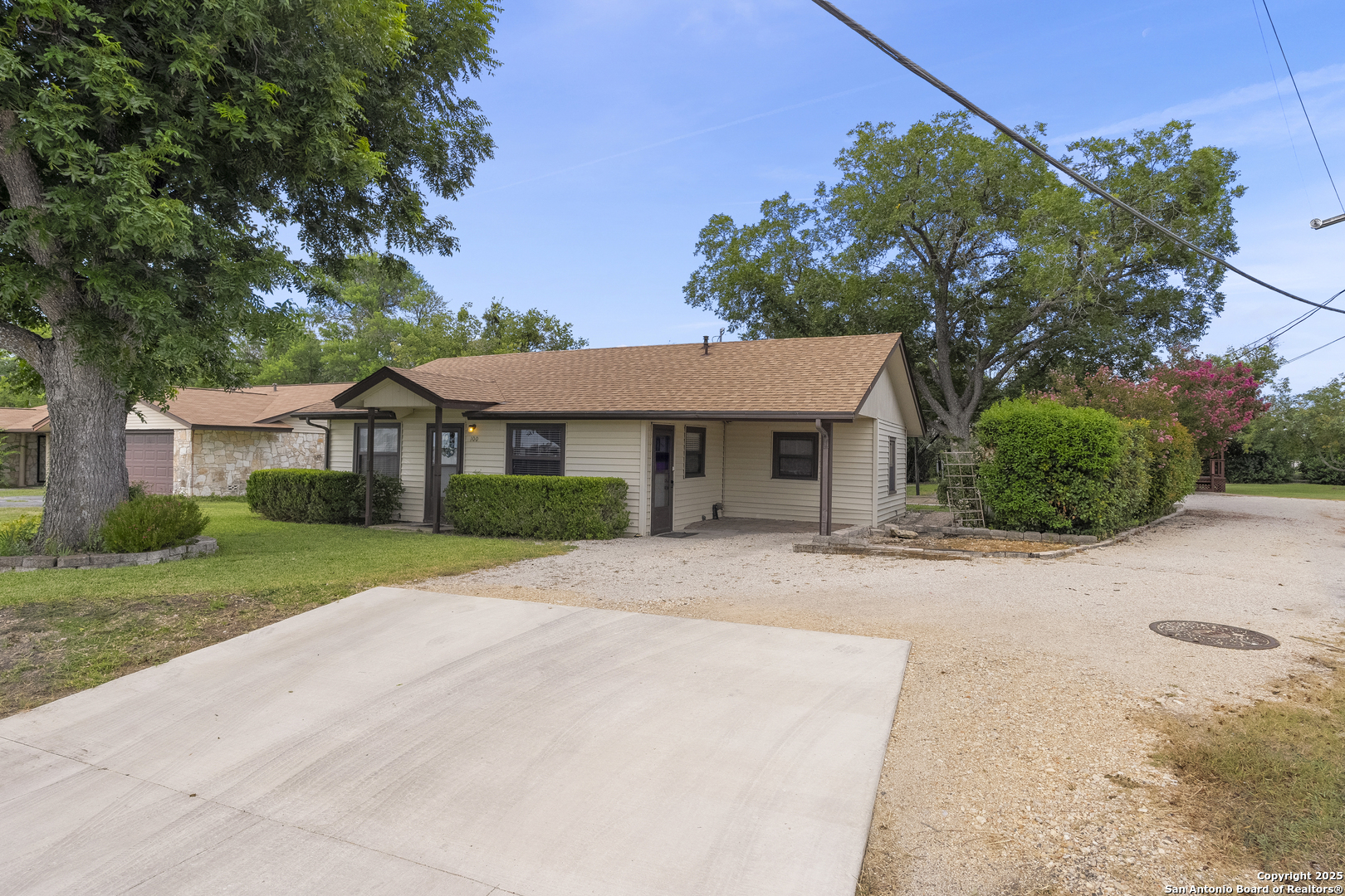 100 Haeckerville Road Cibolo, TX 78108 - Photo 2 of 31 a front view of a house with a yard