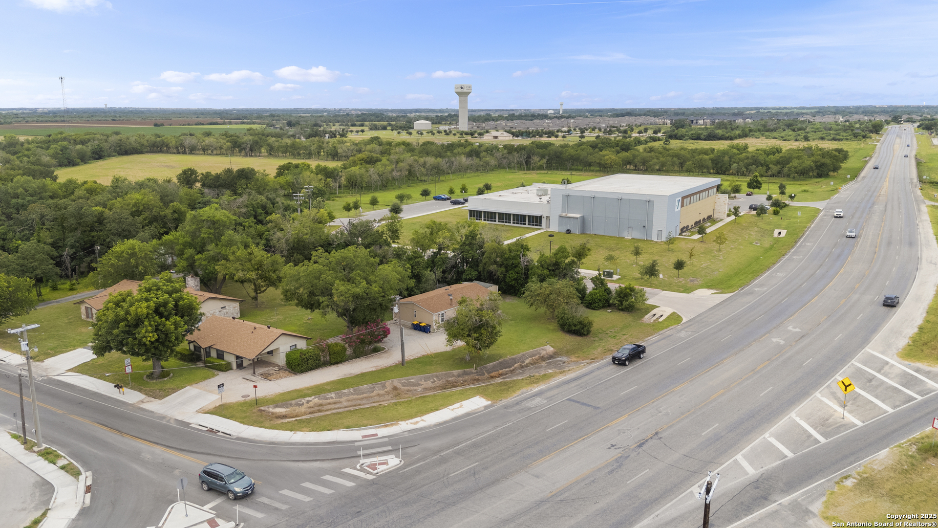 100 Haeckerville Road Cibolo, TX 78108 - Photo 31 of 31 an aerial view of a house with a lake view