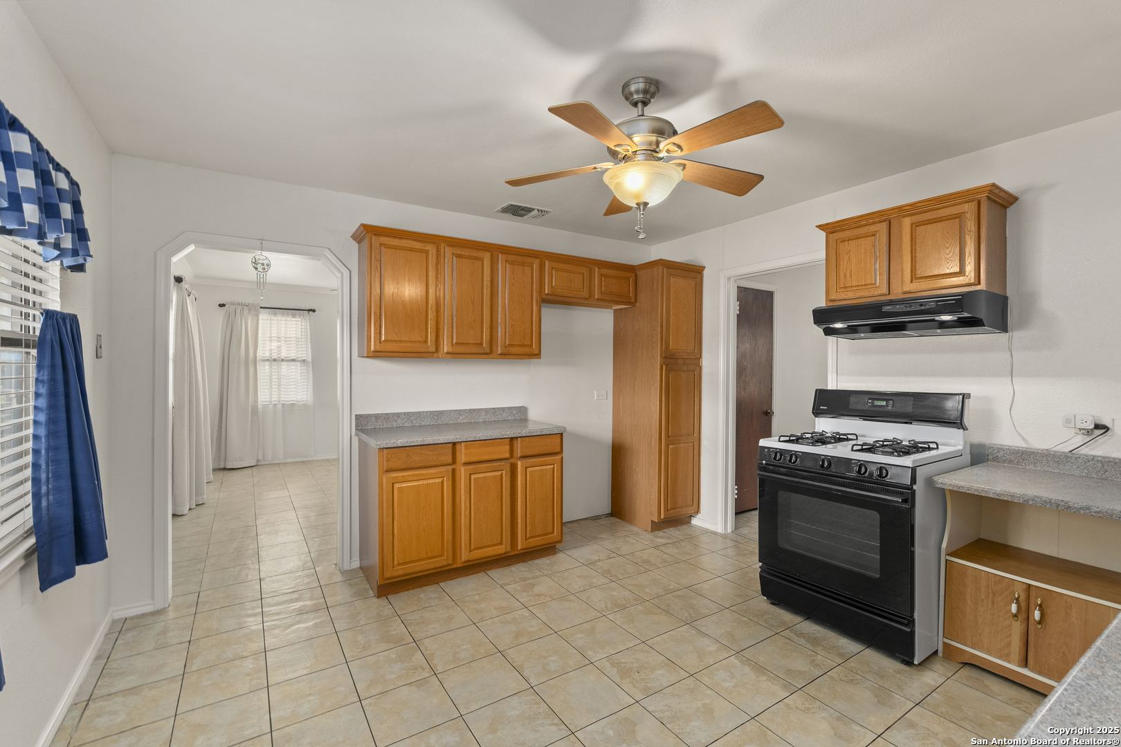 100 Haeckerville Road Cibolo, TX 78108 - Photo 5 of 31 a kitchen with stainless steel appliances granite countertop a stove and a sink