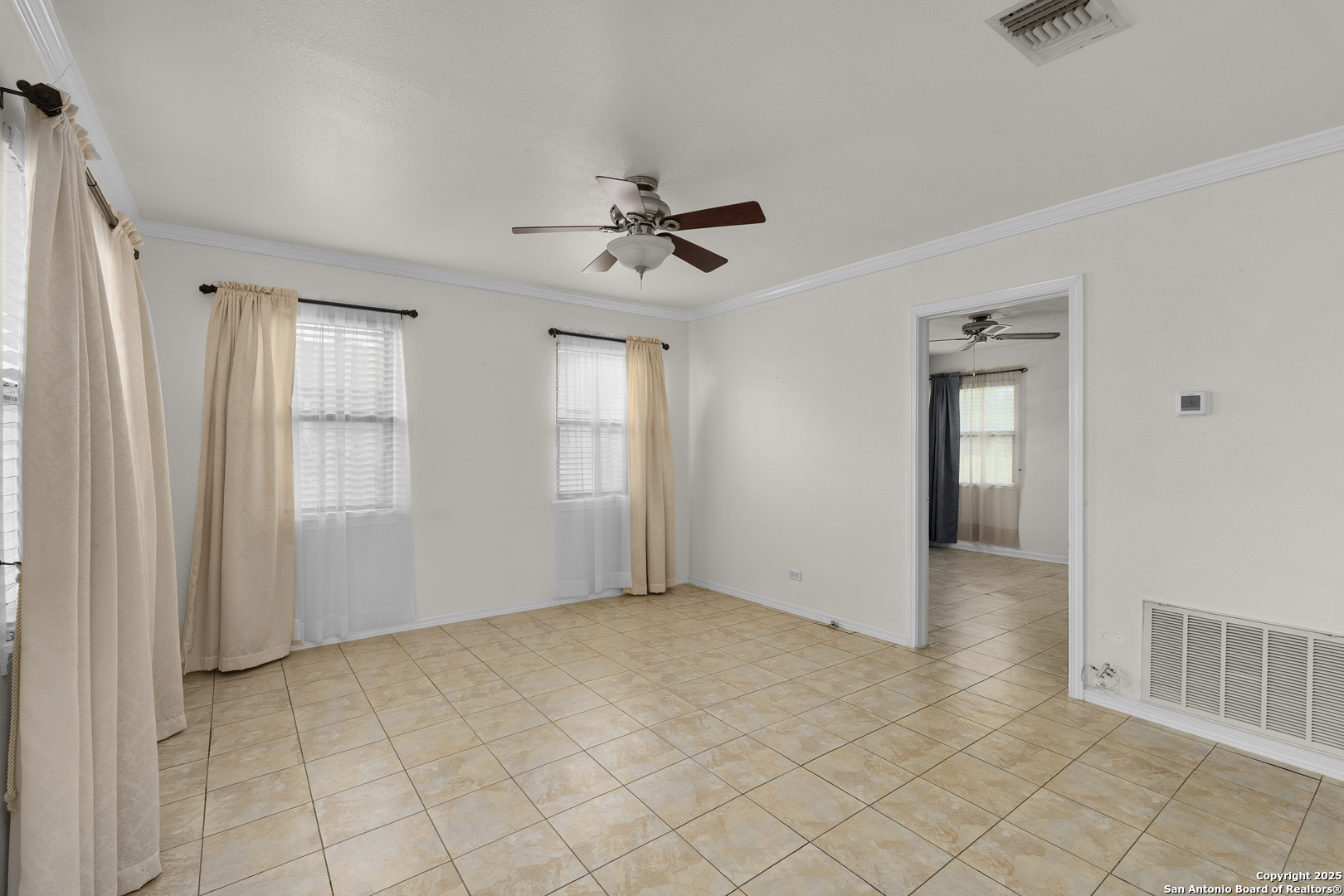 100 Haeckerville Road Cibolo, TX 78108 - Photo 6 of 31 wooden floor in an empty room with a window