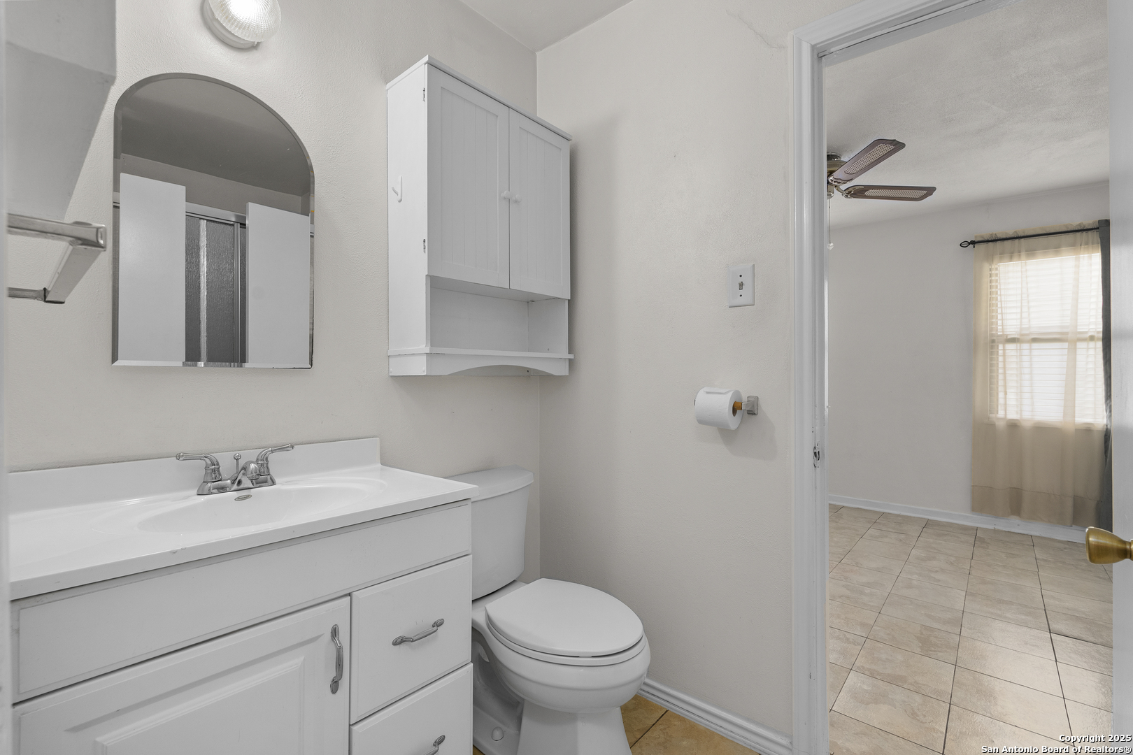 100 Haeckerville Road Cibolo, TX 78108 - Photo 9 of 31 a bathroom with a sink toilet and shower