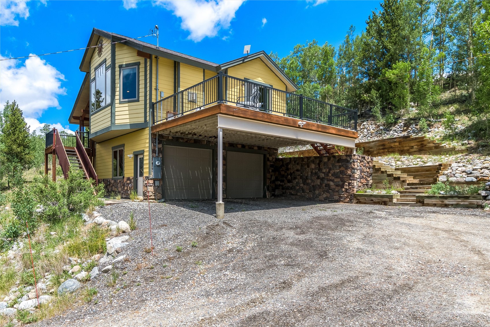 592 Ponderosa Road Fairplay, CO 80440 - Photo 41 of 45 a view of a house with a yard and large tree