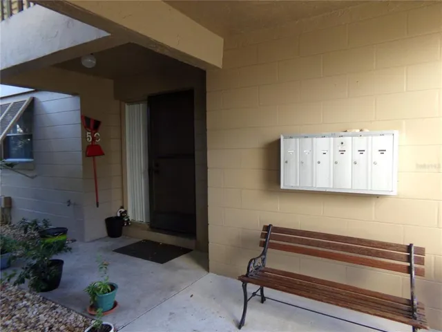 a bench sitting in front of a building