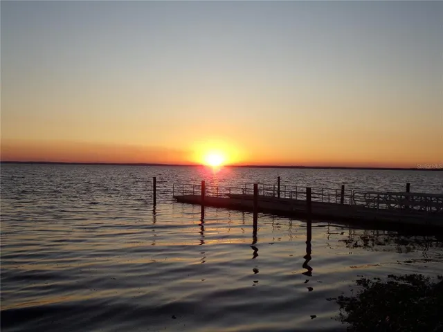 a view of a terrace with a lake view