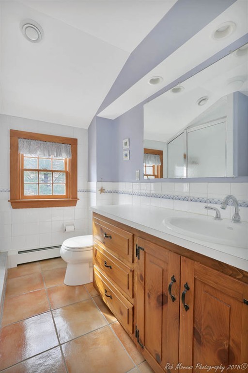 31 Sunrise Road Boxford, MA 01921 - Photo 20 of 30 a bathroom with a sink a mirror and a toilet