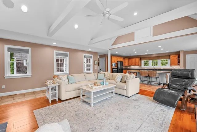 a kitchen with stainless steel appliances granite countertop a stove and a refrigerator