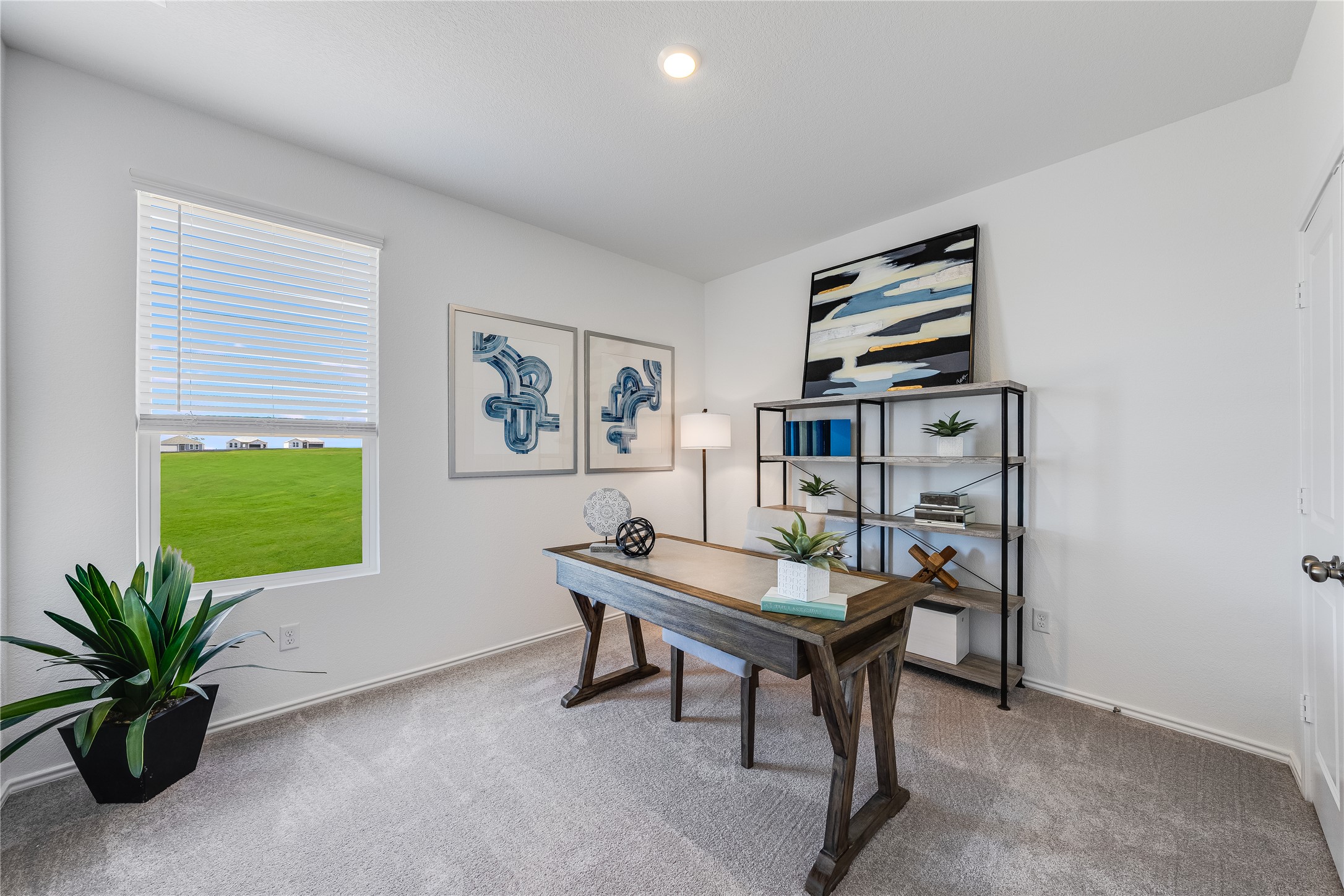 104 Stumpy Street San Marcos, TX 78666 - Photo 14 of 23 Office area featuring light colored carpet and recessed lighting