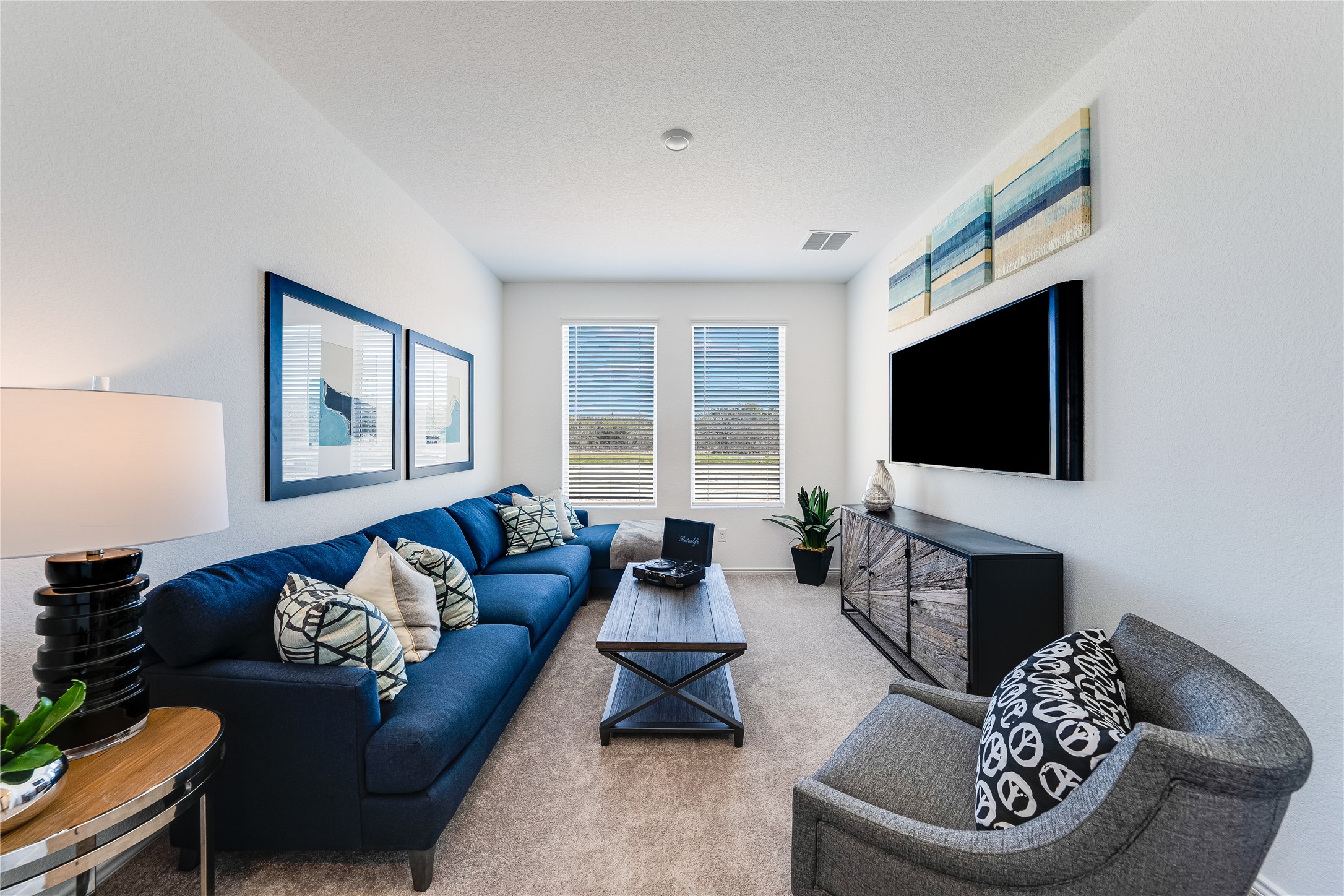 104 Stumpy Street San Marcos, TX 78666 - Photo 16 of 23 Living area featuring carpet and baseboards