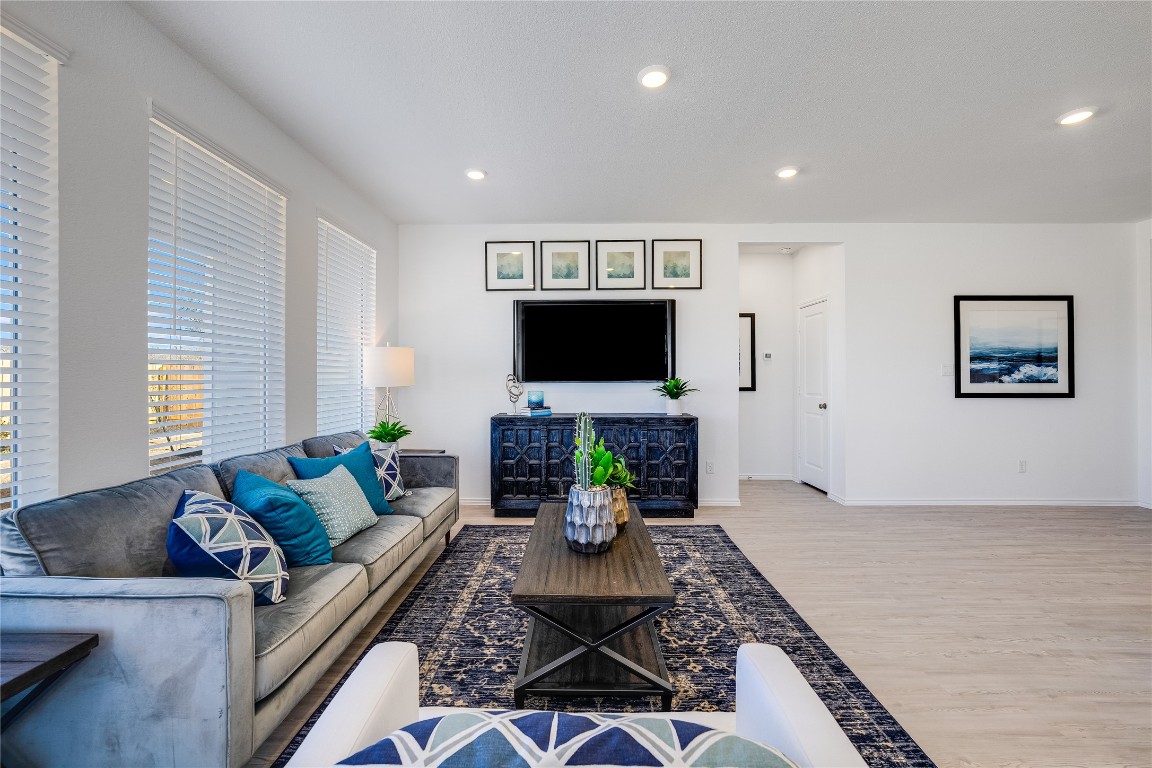 104 Stumpy Street San Marcos, TX 78666 - Photo 7 of 23 a living room with furniture and a flat screen tv