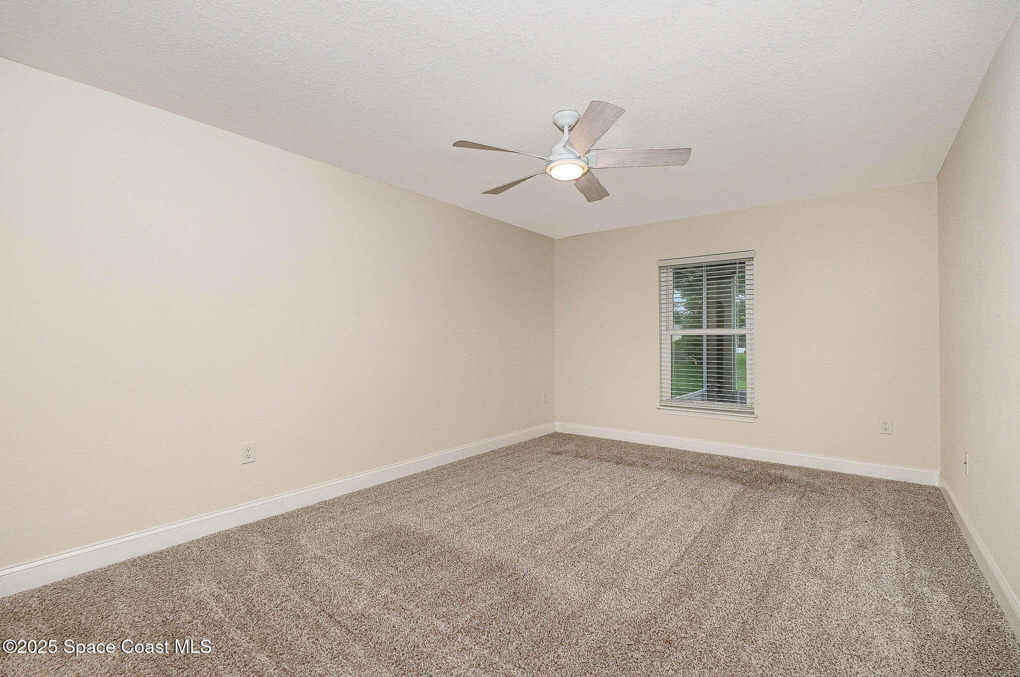 2111 Spring Creek Circle Palm Bay, FL 32905 - Photo 12 of 32 Master Bedroom
