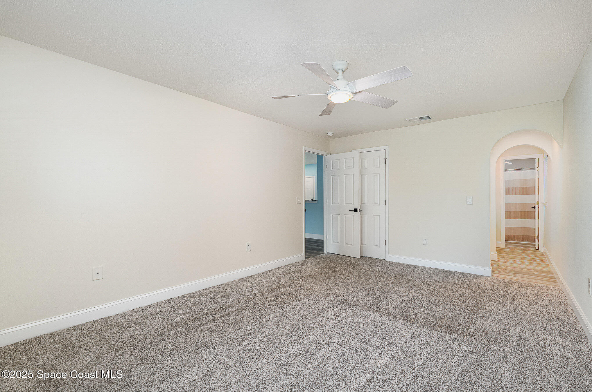 2111 Spring Creek Circle Palm Bay, FL 32905 - Photo 13 of 32 Master Bedroom.Bathroom Doorway
