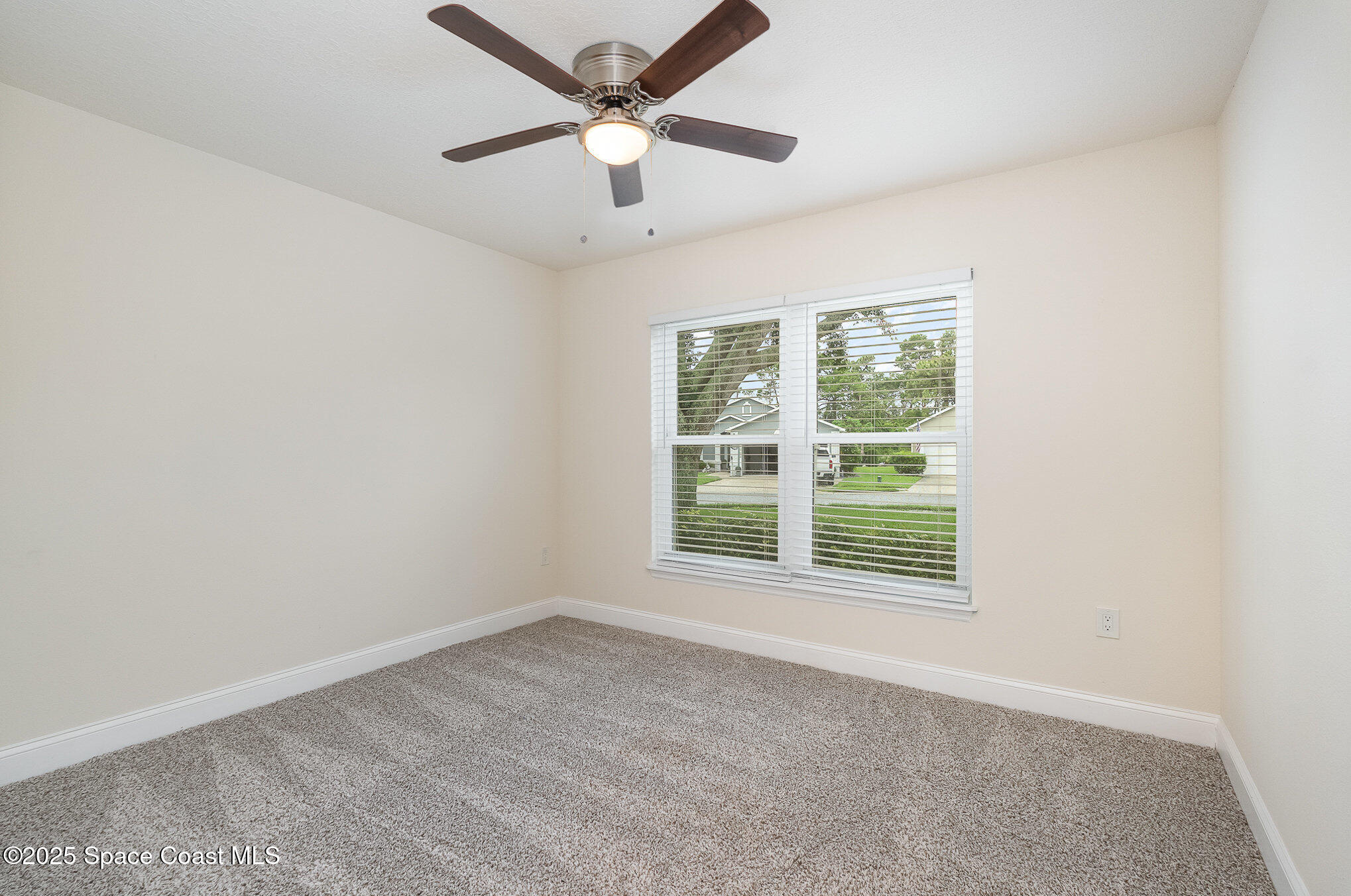 2111 Spring Creek Circle Palm Bay, FL 32905 - Photo 17 of 32 Front Guest Bedroom