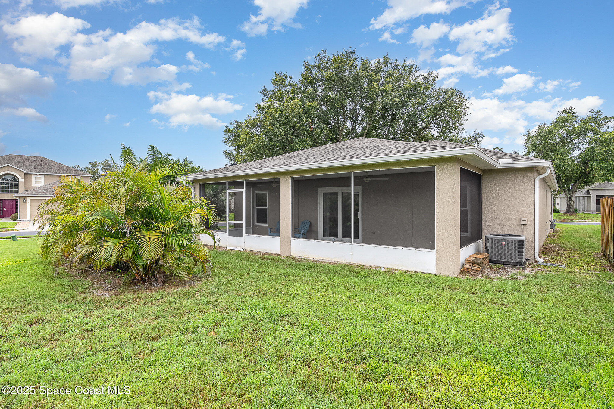 2111 Spring Creek Circle Palm Bay, FL 32905 - Photo 24 of 32 Back of Home