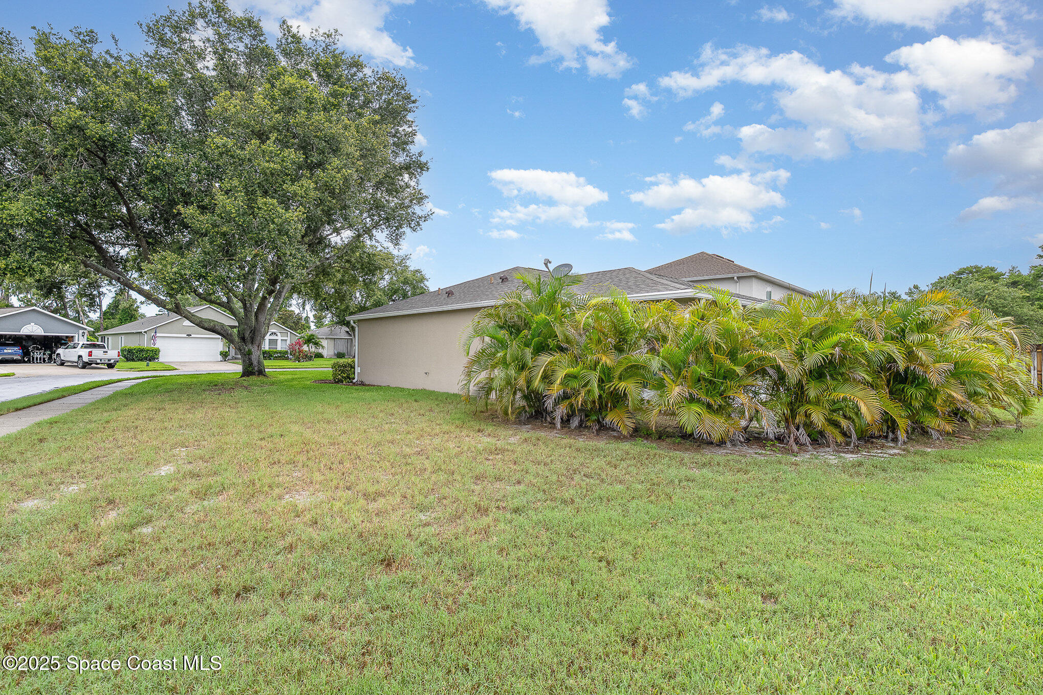 2111 Spring Creek Circle Palm Bay, FL 32905 - Photo 25 of 32 Back.Side of Home