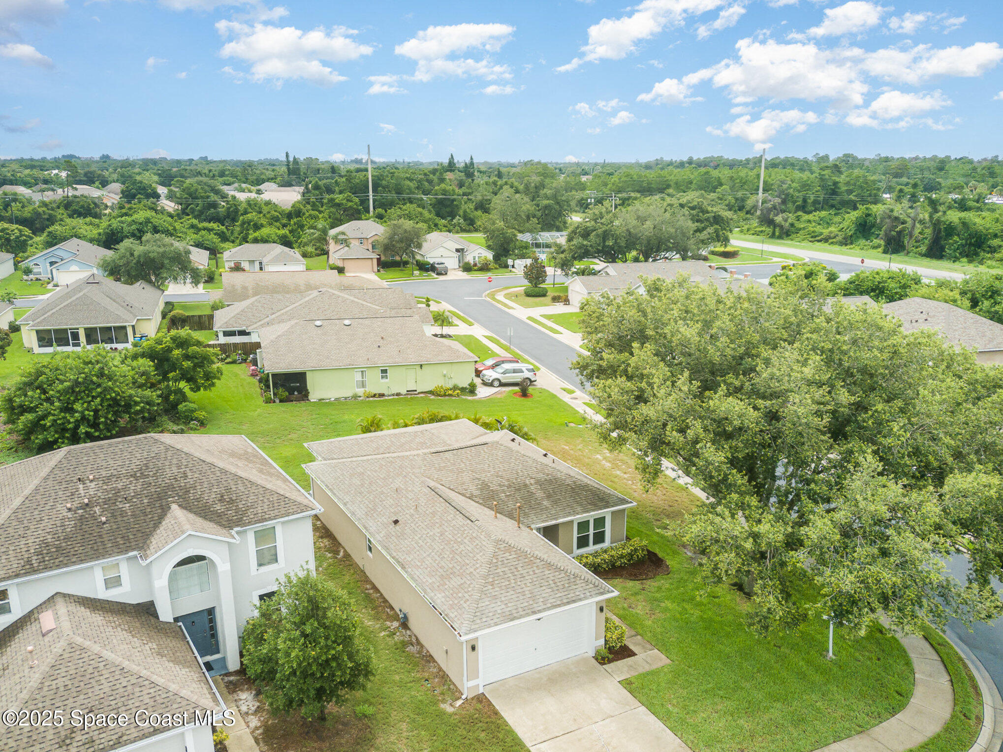 2111 Spring Creek Circle Palm Bay, FL 32905 - Photo 30 of 32 Overall Property.Home on Corner