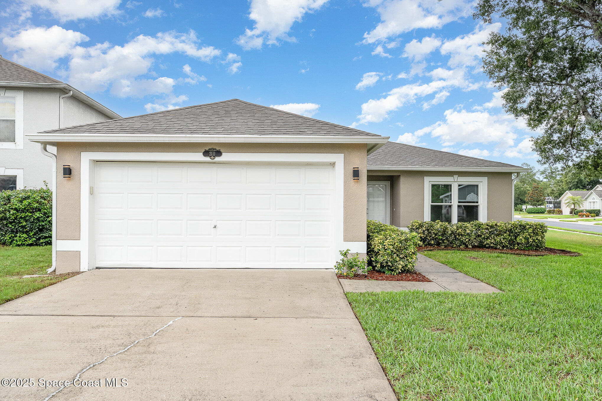 2111 Spring Creek Circle Palm Bay, FL 32905 - Photo 3 of 32 Front of Home