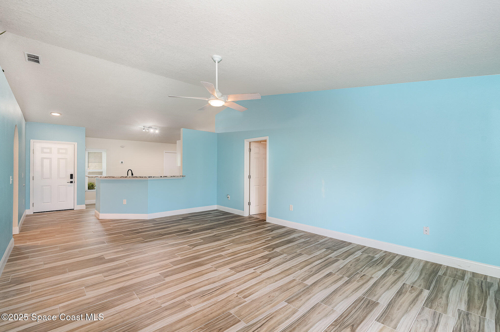 2111 Spring Creek Circle Palm Bay, FL 32905 - Photo 7 of 32 Living Area.Kitchen.Master Doorway
