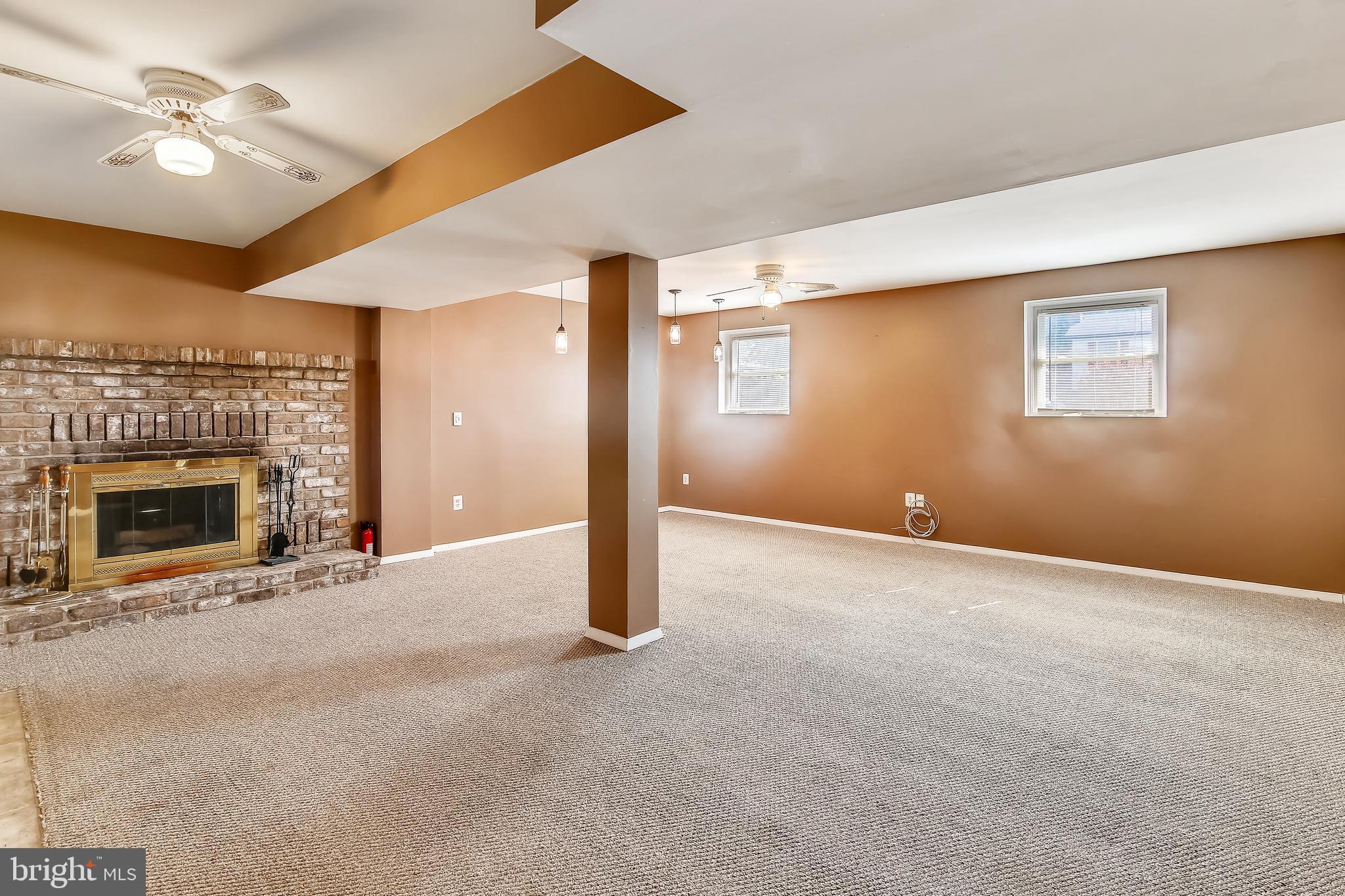 8 Centerside Road Mount Airy, MD 21771 - Photo 20 of 29 Basement with fireplace