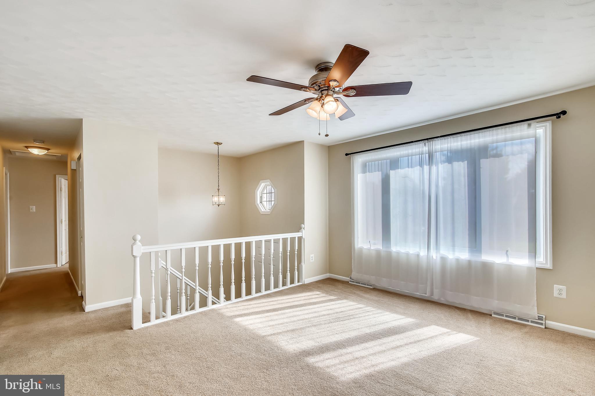 8 Centerside Road Mount Airy, MD 21771 - Photo 8 of 29 Living room looking to foyer and down the hall