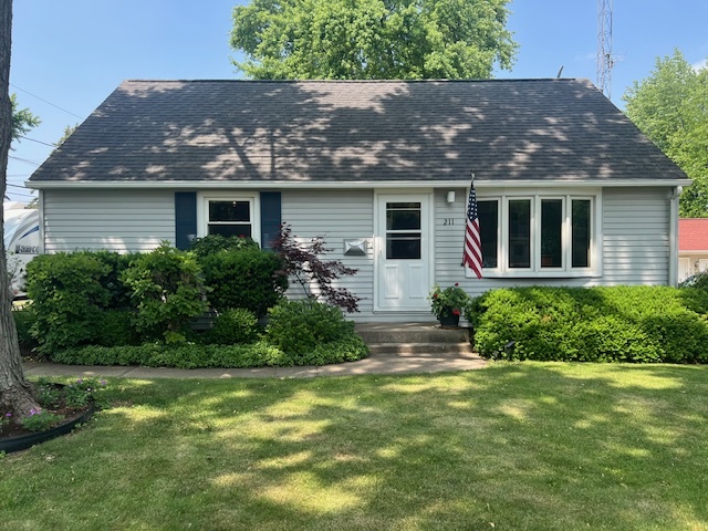 front view of house with a yard