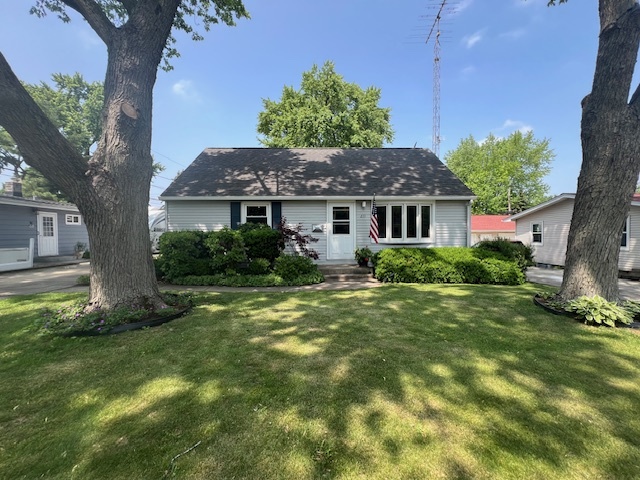 211 Koch Drive Genoa, IL 60135 - Photo 2 of 29 a front view of a house with a yard