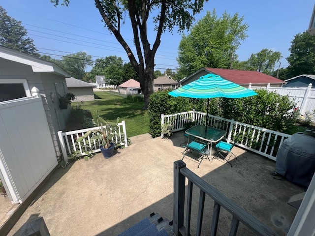 211 Koch Drive Genoa, IL 60135 - Photo 23 of 29 a view of deck with furniture and a yard