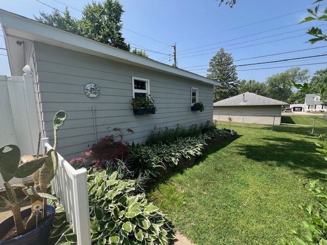 211 Koch Drive Genoa, IL 60135 - Photo 27 of 29 a backyard of a house with lots of green space