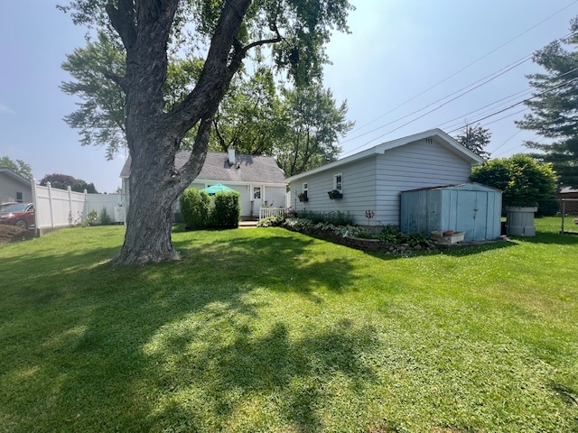 211 Koch Drive Genoa, IL 60135 - Photo 28 of 29 a backyard of a house with lots of green space