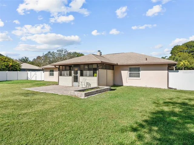 a front view of a house with a garden and porch