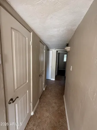 a view of backyard of a house