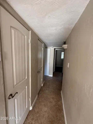 a view of backyard of a house