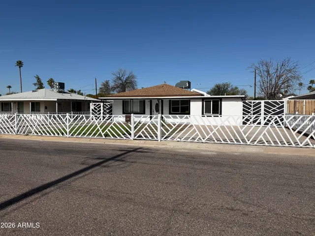 a front view of a house with garage