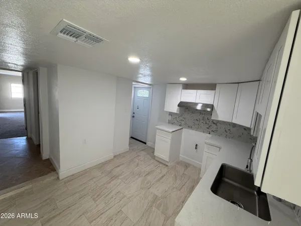 a view of a storage & utility room