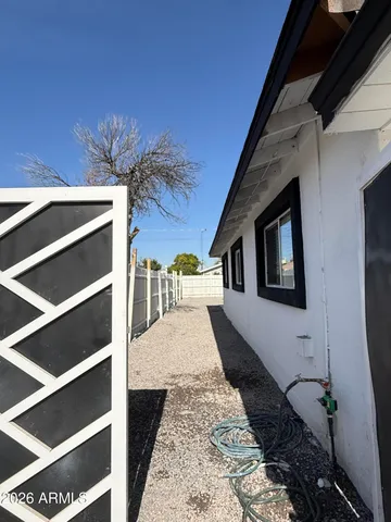 a house with trees in front of it