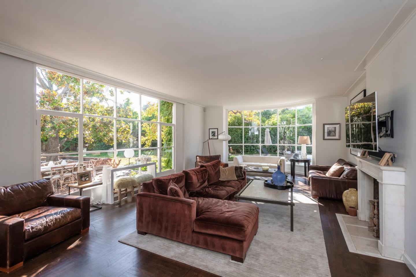 405 Chapin Lane Burlingame, CA 94010 - Photo 3 of 18 a living room with furniture and a large window