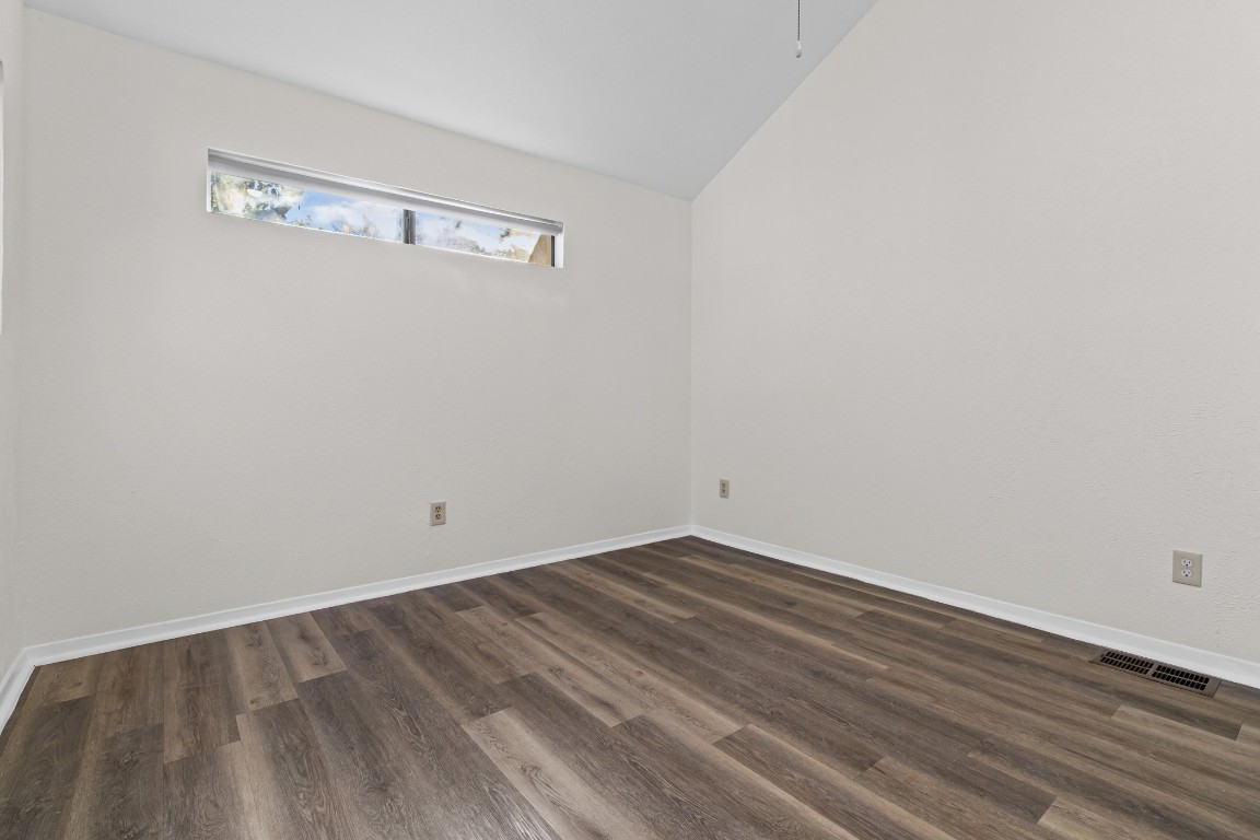1713 Cinnamon Path, Unit B Austin, TX 78704 - Photo 15 of 32 a view of a room with wooden floor