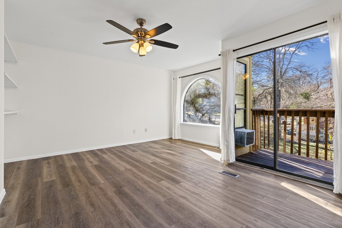 1713 Cinnamon Path, Unit B Austin, TX 78704 - Photo 17 of 32 wooden floor in a room next to a window