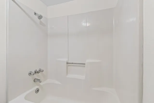 a bathroom with a bathtub