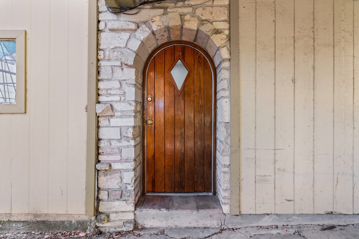 1713 Cinnamon Path, Unit B Austin, TX 78704 - Photo 2 of 32 a view of a door with a outdoor space