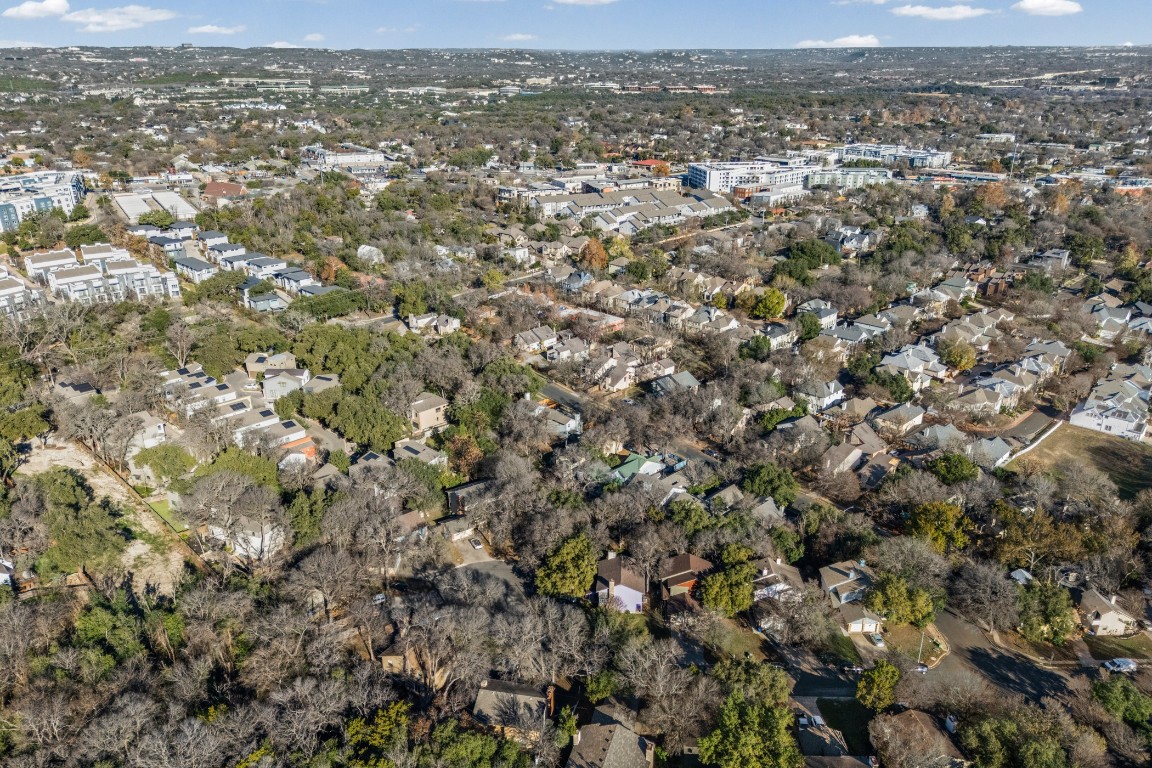 1713 Cinnamon Path, Unit B Austin, TX 78704 - Photo 29 of 32 an aerial view of residential houses with city view