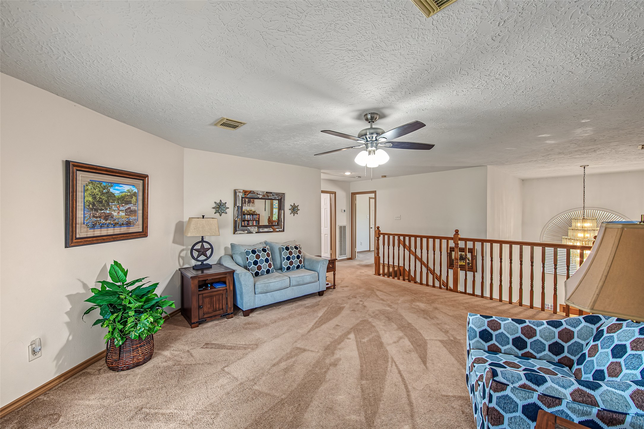 1345 Peach Ridge Road Brookshire, TX 77423 - Photo 33 of 50 Soft plush carpeting underfoot creates a warm, comfortable ambiance, while recessed lighting and a central ceiling fan keep the room bright and airy.