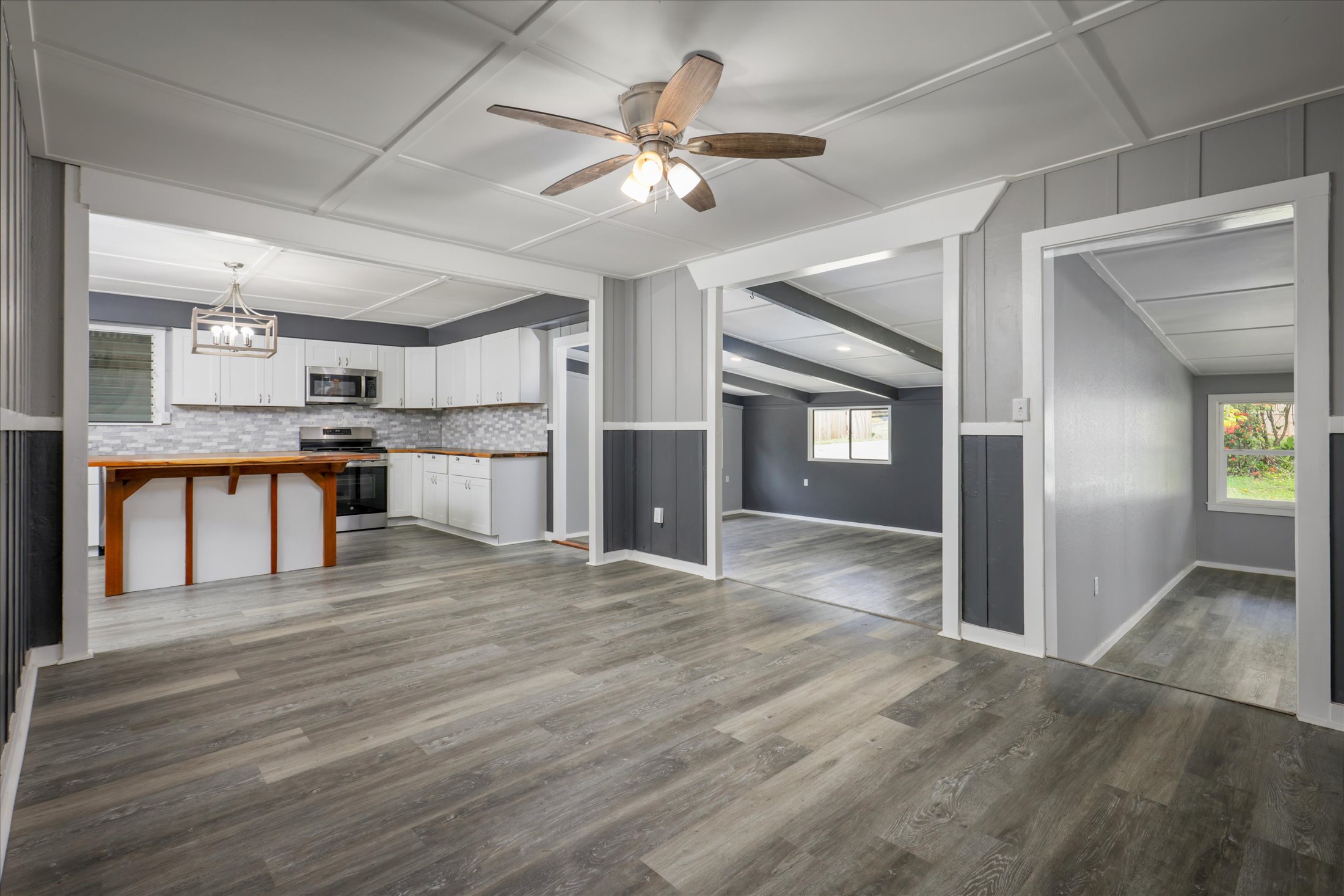 55-545 Hawi Road Hawi, HI 96719 - Photo 11 of 27 a view of a kitchen with a sink and cabinets