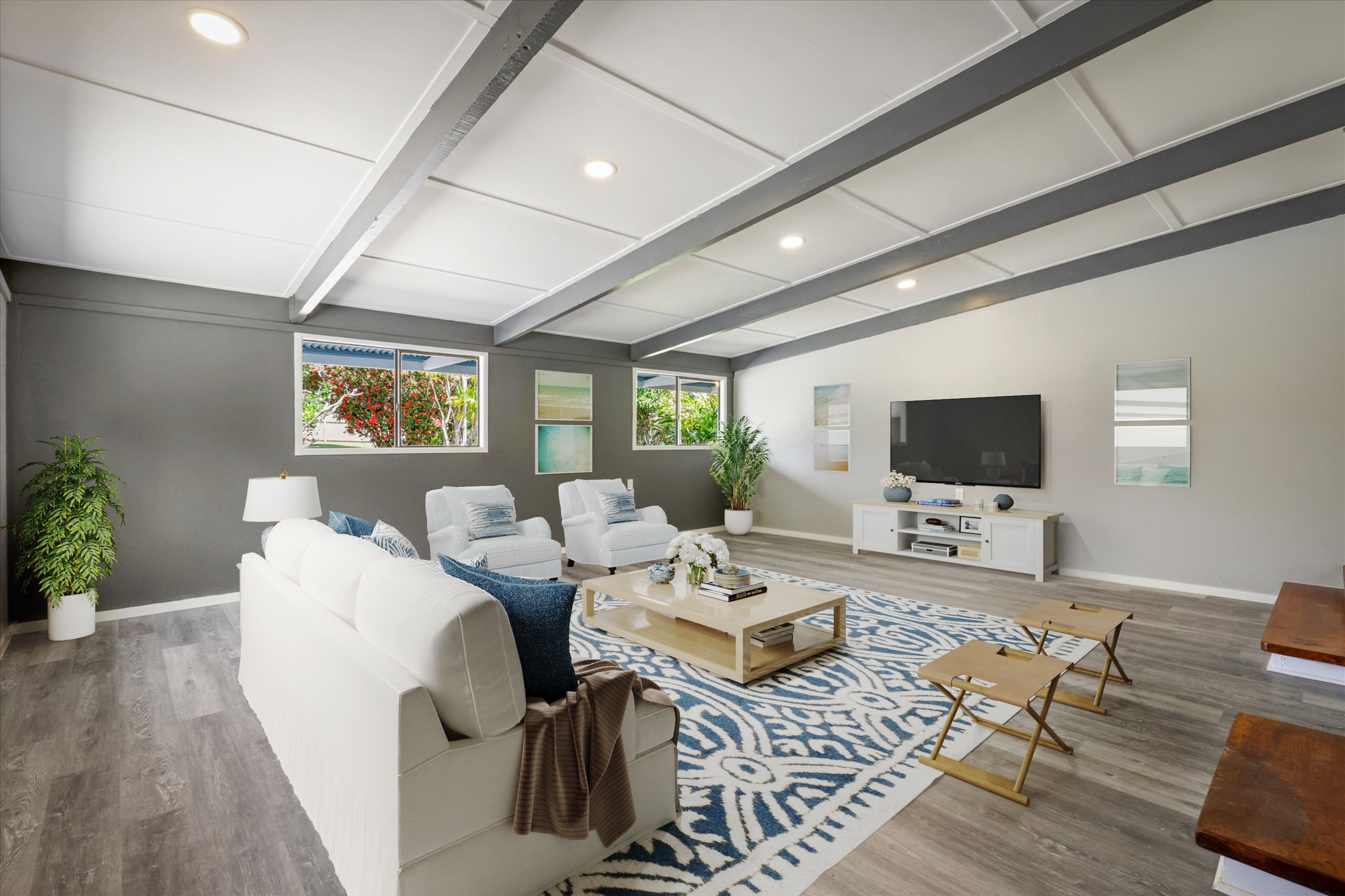 55-545 Hawi Road Hawi, HI 96719 - Photo 12 of 27 a living room with furniture wooden floor and a flat screen tv