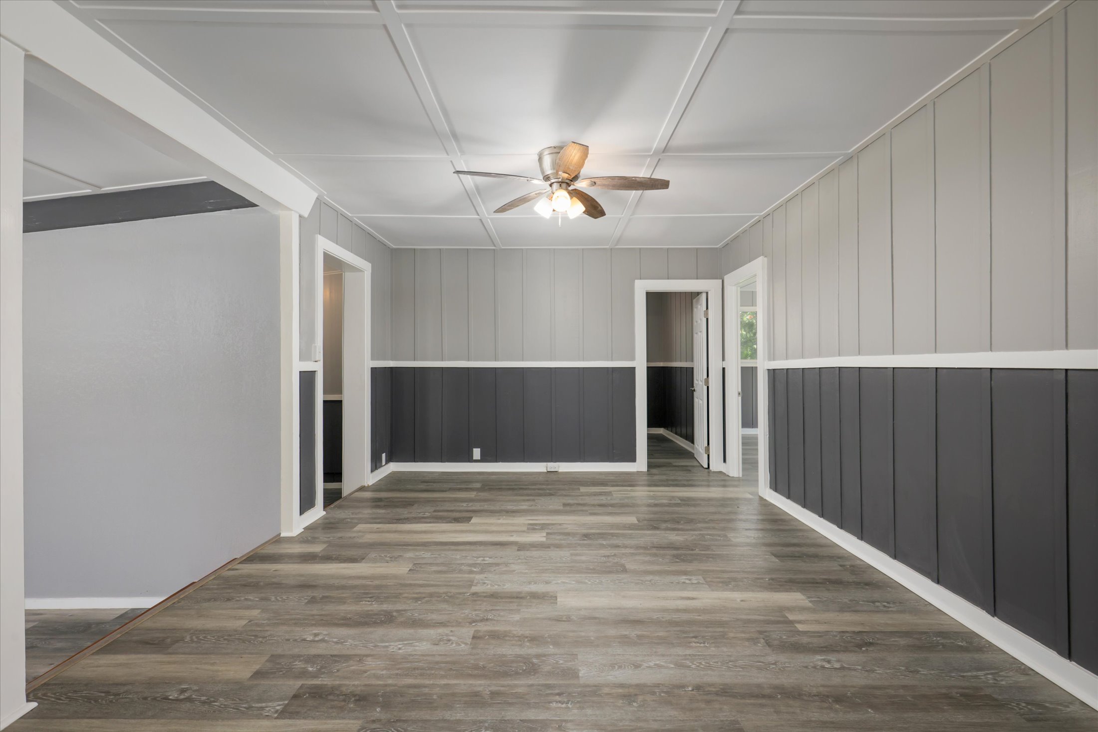 55-545 Hawi Road Hawi, HI 96719 - Photo 15 of 27 a view of a livingroom with a ceiling fan & kitchen view