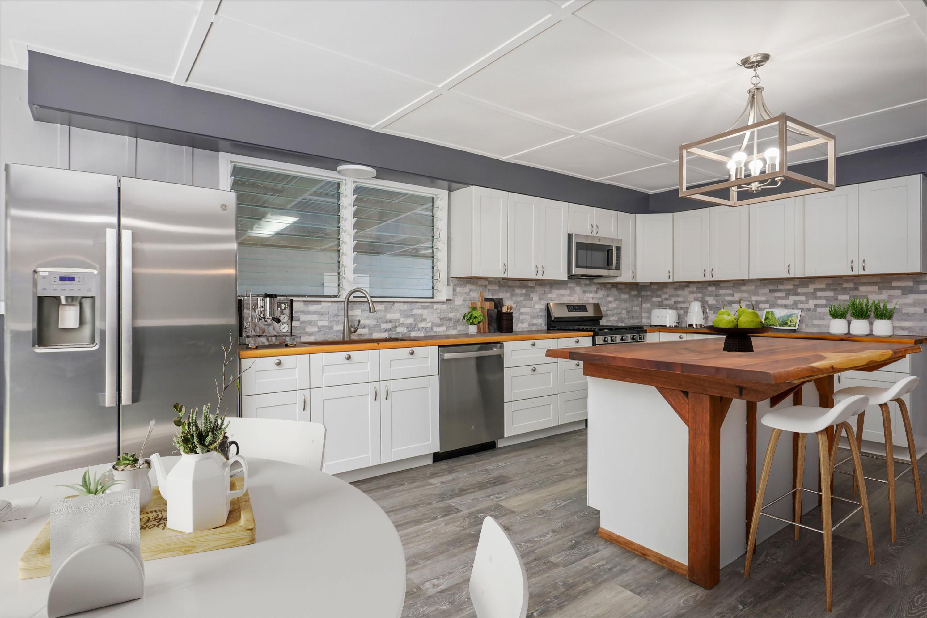 55-545 Hawi Road Hawi, HI 96719 - Photo 6 of 27 a kitchen with stainless steel appliances granite countertop a sink dishwasher a refrigerator with wooden floor and cabinets