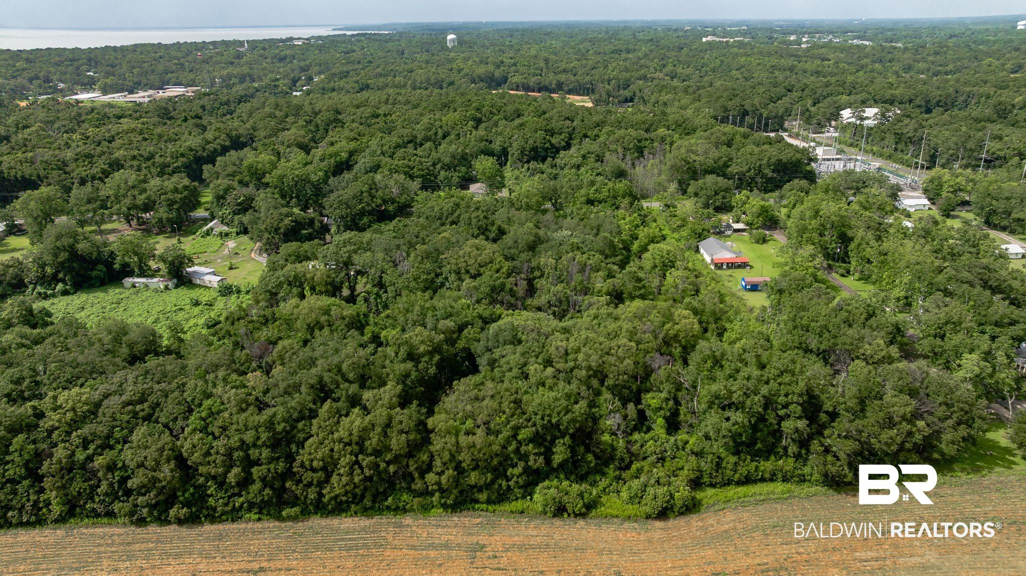 7360 Twin Beech Road Fairhope, AL 36532 - Photo 16 of 16 Aerial overview of property's location with a forest