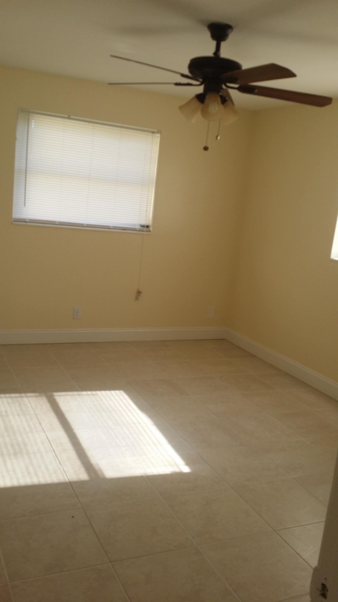 440 West 31st Street Riviera Beach, FL 33404 - Photo 5 of 8 master bedroom