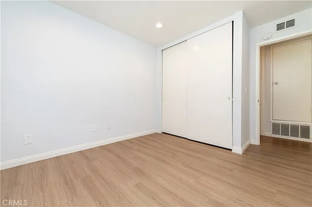 a white bath tub with a shower