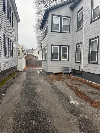 a front view of a house with yard